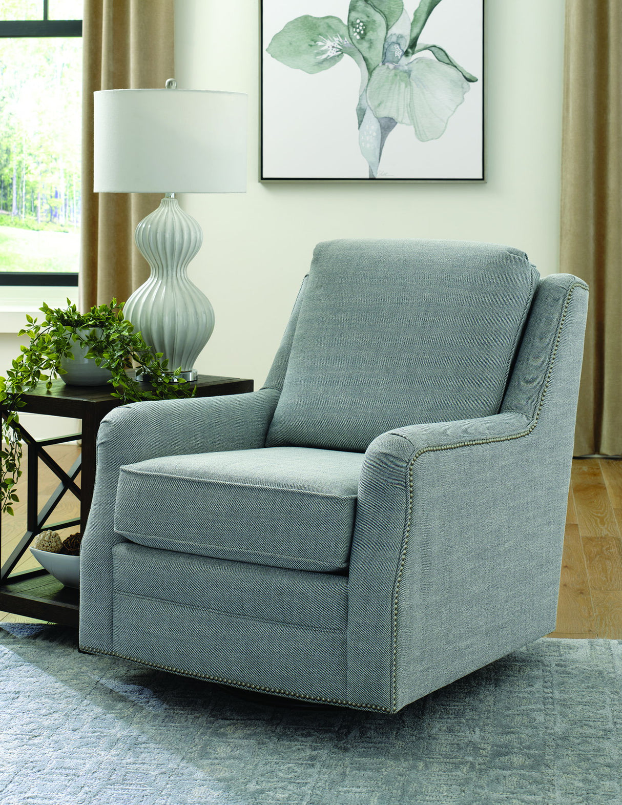 Emory - Swivel Glider With Nails