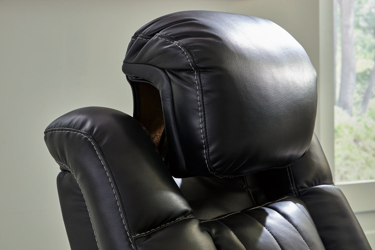 Caveman Den - Power Reclining Loveseat with Console/ Adj Hdrst - Midnight