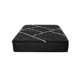 Restonic Black Hybrid Plush mattress with a black quilted cover and white diagonal stitching.