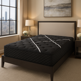 Restonic Black Hybrid Plush mattress with cooling tech, TempaGel memory foam, and Marvelous Middle support on a bed.