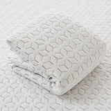 Copper Mattress Protector folded showing geometric copper-infused fabric